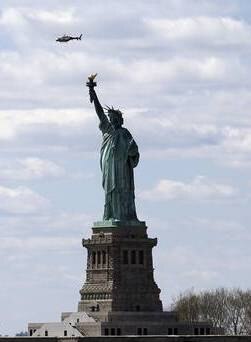 Woman climbs Statue of Liberty to protest family separations Woman climbs Statue of Liberty to protest family separations