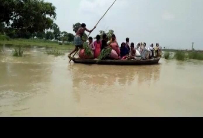 As rainfall lashed Bihar, many villagers were forced to leave the area causing acute trouble for them. (Video grab: ABP Live)