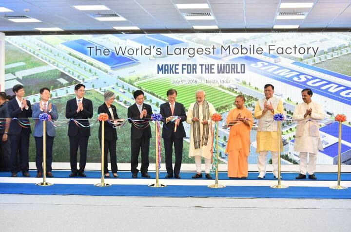 Uttar Pradesh Chief Minister Yogi Adityanath, Union Minister Mahesh Sharma and other dignitaries were also present at the opening of the new 35-acre Samsung Electronics facility, which is also the world’s largest mobile phone production unit. Photo: PIB