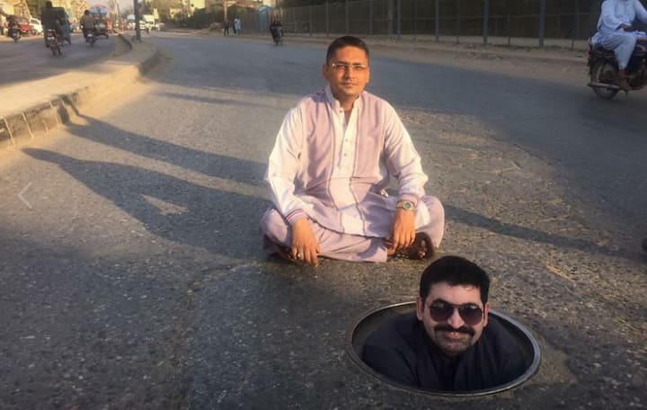 Motiwala posts all the pictures on his Facebook account. He has previously posed for photograph from inside a pothole. Image- Facebook/ Ayaz Memom Motiwala
