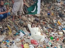 Bizarre! After posing in sewage water, this Pakistani politician gets in gutter and garbage to ask for votes