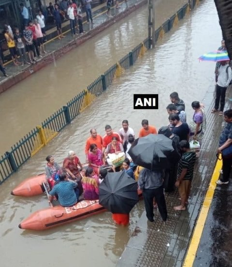 Navy helps evacuate stranded commuters from railway station in Mumbai Navy helps evacuate stranded commuters from railway station in Mumbai