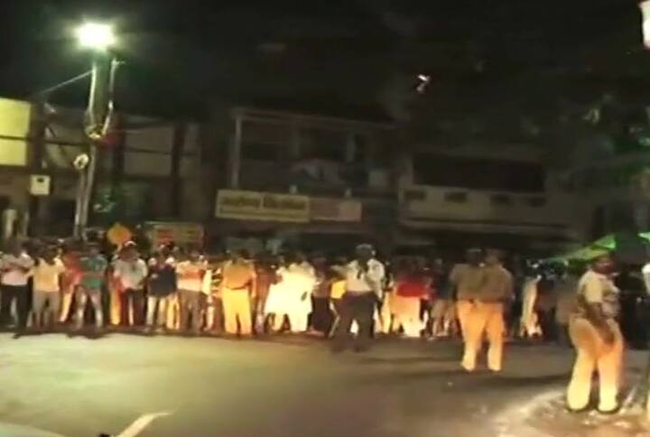 Crowd chanted 'Modi Modi' as the convoy of Prime Minister Narendra Modi traveled through Varanasi. PM Modi waved back at the people. (ANI)