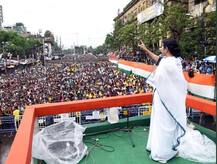 In pics: Mamata Banerjee addresses Martyrs\' Day rally in Kolkata; People, TMC supporters swamp streets