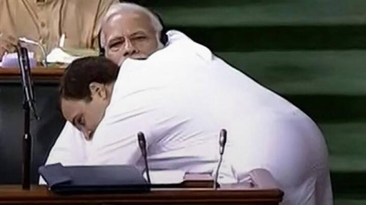 The party workers replicated the gesture of party President Rahul Gandhi when he hugged PM Modi in Parliament. 