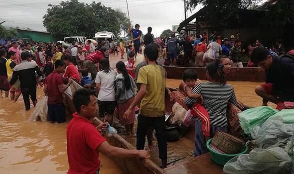 The bodies of 17 people have been recovered after flash floods. AFP PHOTO / ATTAPEU TODAY