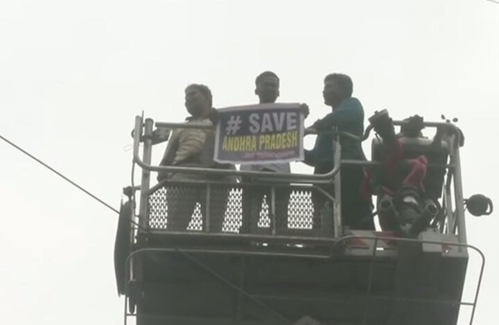 Man climbs tower in Delhi to demand special status for AP Man climbs tower in Delhi to demand special status for Andhra Pradesh