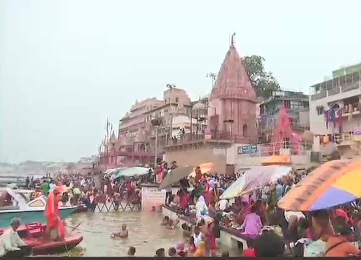 Devotees also took holy dip in river Ganga in Varanasi. (ANI Image)