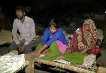 People who lived in areas along banks of river Yamuna evacuated after water level rose, leaving them homeless