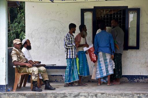 People wait to check if their names are included in the National Register of Citizens at a draft center in Mayoung, about 55 kilometers (34 miles) east of Gauhati, India, Monday, July 30, 2018. PIC/AP.