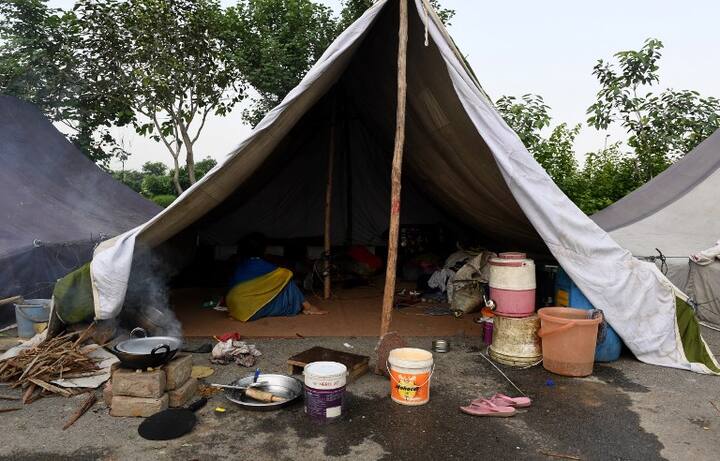 Overflowing water from the Yamuna river encroaches low-lying areas due to recent heavy rainfall/ AFP