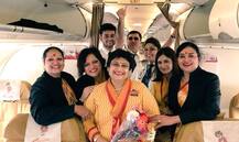 Daughter pilots air hostess mother\'s farewell flight, makes her dream come true