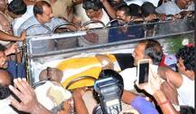 Pics: Followers Shout \'Long Live Kalaignar\' At Rajaji Hall Where Karunanidhi\'s Mortal Remains Are Kept