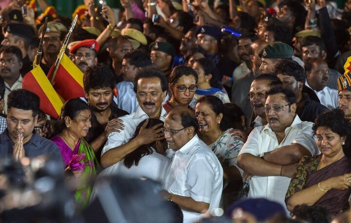 DMK chief Karunanidhi interred amidst tears by milling crowd of well wishers at Marina Karunanidhi interred at Marina amidst tears by milling crowd of well wishers