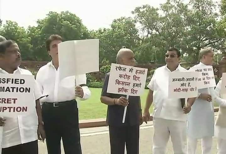 MPs from various left parties also participated holding placards, raising slogans against Modi government.
