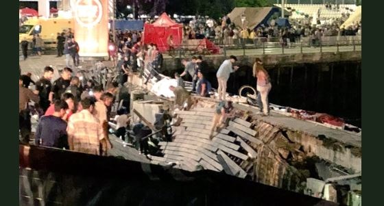 BIZARRE! Viral video shows stage collapses into sea in the middle of live performance; Watch  BIZARRE! Stage collapses into sea in the middle of live performance; Watch video