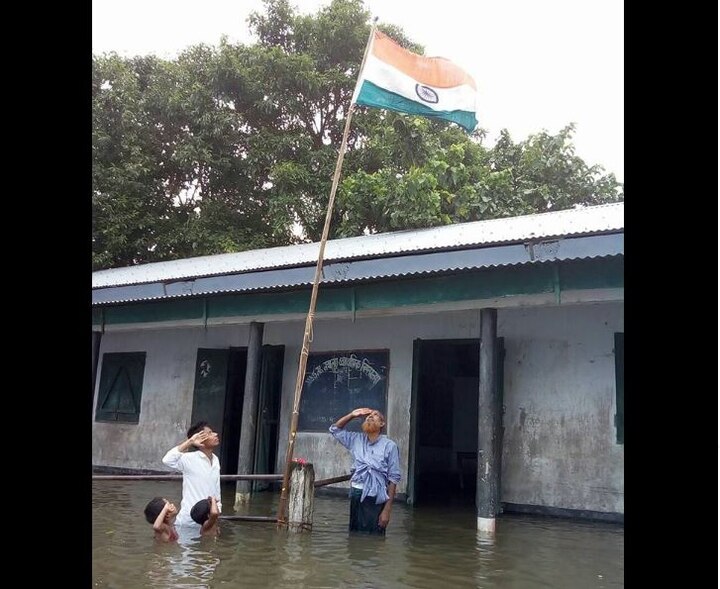 Boy who saluted Tricolour in chest-deep flood water not in NRC draft Boy who saluted Tricolour in chest-deep flood water not in NRC draft