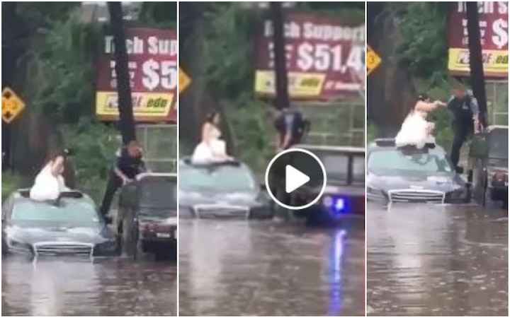 WATCH: Bride stranded on top of car in flood waters rescued by cops WATCH: Bride stranded on top of car in flood waters rescued by cops