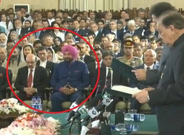 NEW DELHI: Navjot Singh Sidhu’s seating arrangement stirred controversy Pakistan Tehreek-e-Insaf’s chairperson swearing in ceremony. (ABP News Grab)