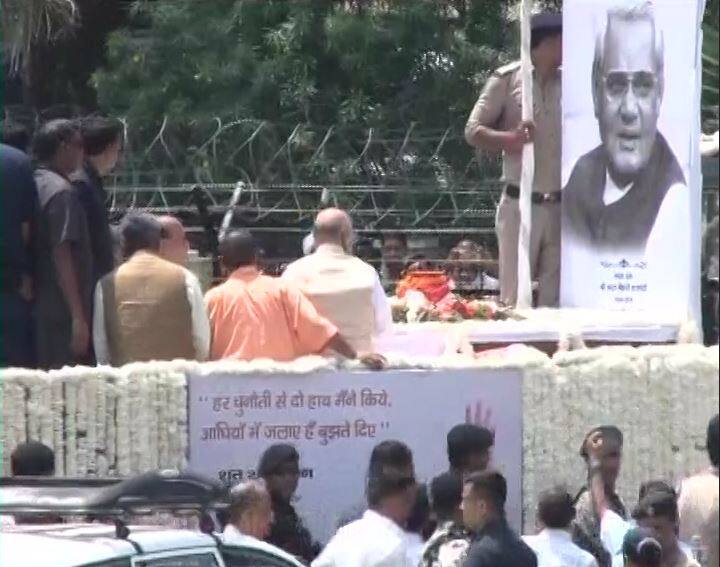 Life size portraits of Atal Ji are being carried in the procession . Popular quotes said by the former PM can be seen written on banners and vehicles. (Image: screengrab/ ABP News)