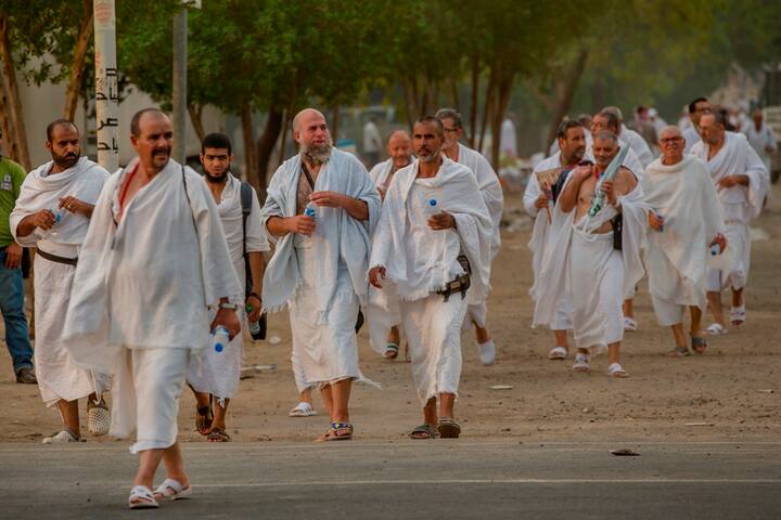 During the hajj, pilgrims are expected to shed symbols of materialism, though the trip itself can be quite expensive for most. Male pilgrims are required to wear seamless, white terrycloth garments for the entirety of the hajj. Women wear loose clothing, cover their hair and forgo makeup and nail polish to achieve a state of humility and spiritual purity. Photo: AP
