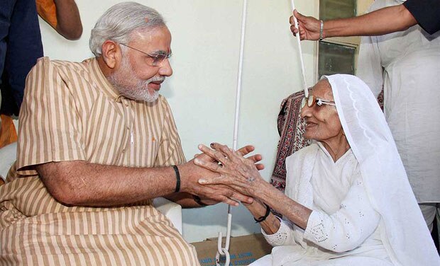 Gujarat: PM Modi surprises family as he reaches home to meet mother sans security  Gujarat: PM Modi surprises family as he reaches home to meet mother sans security