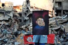 PICTURES: These artists translate suffering of a war-torn country into art at Syria\'s Yarmuk camp