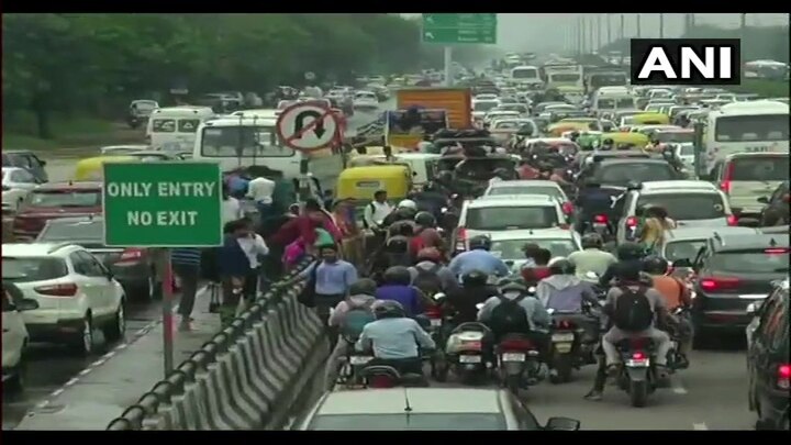 Traffic jam at Delhi-Jaipur Expressway due to waterlogging caused by heavy rainfall in parts of Delhi NCR.