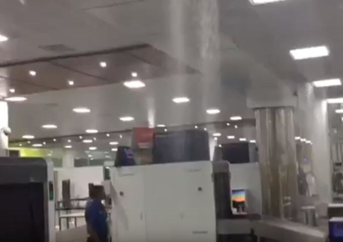 WATCH: Rain water gushes in through leaking roof of Guwahati airport's passenger lounge WATCH: Rain water gushes in through leaking roof of Guwahati airport's passenger lounge