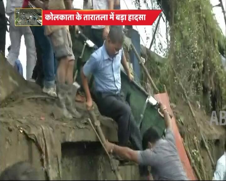 Several motorbikes and a mini bus can be seen lying on top of the collapsed bridge. (ABP NEWS GRAB)