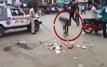 VIRAL SACH: Policeman forcing kid to sweep road?