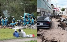 PICTURES: Rescue workers scrabble through mud to find stuck survivors as toll reaches 16 in Japan earthquake