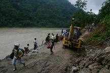 IN PICS: Tourists Forced To Walk On Railway Bridge After Massive Landslide Blocks NH 31-C Near Siliguri