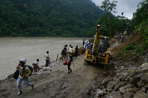 NEW DELHI: Landslide occurred on Tuesday morning on National Highway 31(C) in Mongpong, Kalimpong district. AFP IMAGE