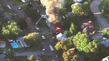 PICTURES: Dozens of houses ENGULFED by fire after multiple gas explosions rock Boston