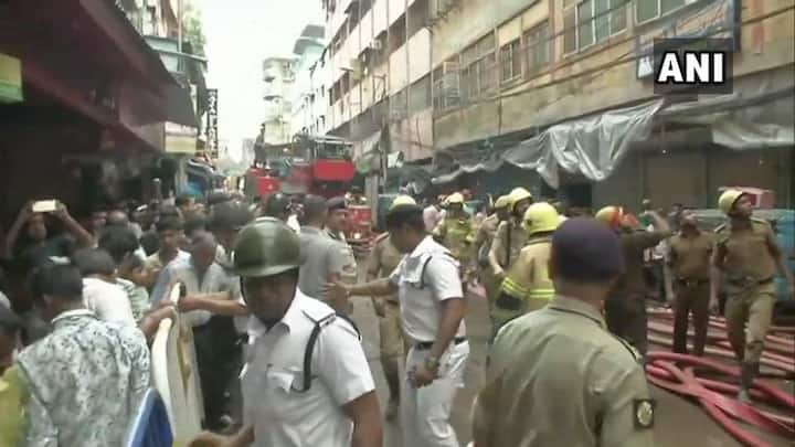 Traders from adjacent buildings were seen fleeing amid fumes and explosion-like sounds from gas cylinder blasts with whatever commodities they could recover from their shops. (Image: ANI)