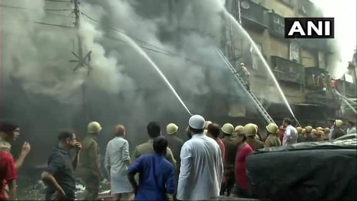 Thirty fire tenders have been pressed into service to contain the blaze that has been raging for over 12 hours. Fire brigade personnel were seen cutting through grills and shutters to make way into the six-storey building, but the congestion in the area made the operation difficult. (Image: ANI)
