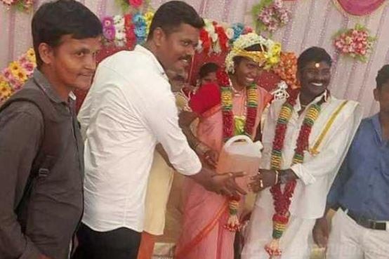 Tamil Nadu: Friends present 'petrol' to groom as wedding gift Friends present 5 litres petrol to Tamil Nadu groom as wedding gift