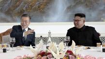 Moon, Kim take historic trip to sacred N.Korean mountain on final day of summit