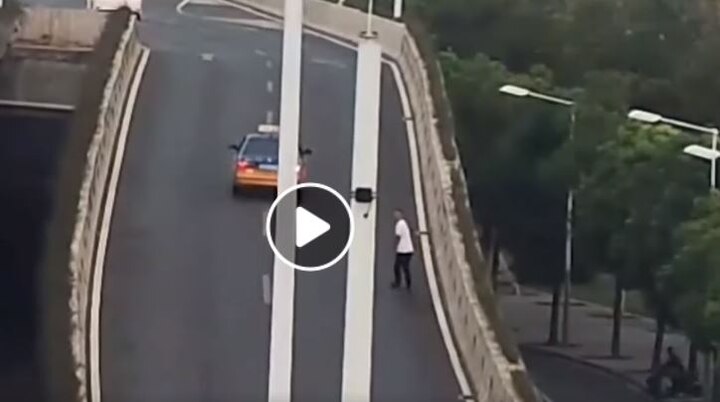 WATCH: Bizarre! Man jumps off overpass to escape drink-driving test despite being sober WATCH: Bizarre! Man jumps off overpass to escape drink-driving test despite being sober