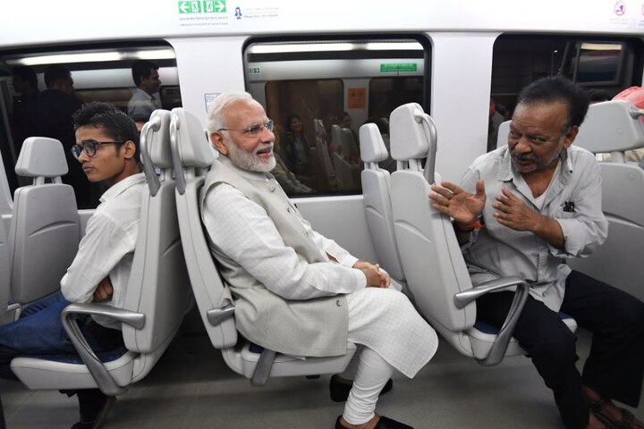 Congress takes a jibe at Narendra Modi's Metro ride, asks if soaring fuel prices forced PM to board train? Congress takes jibe at Modi's Metro ride, asks if soaring fuel prices forced PM to board train?