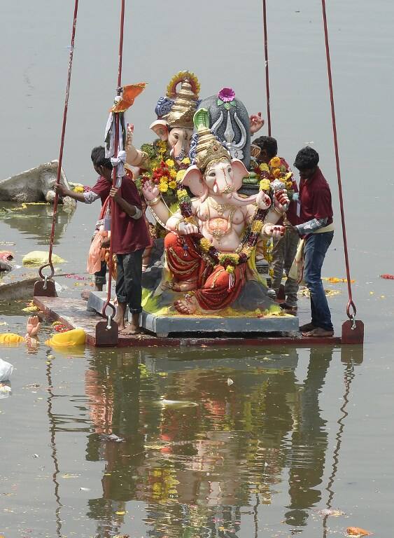 This year, the Ganesh festival also became a public outreach opportunity for politicians, who are eyeing blessings of both Lord Ganesh and his devotees ahead of an election year. A visual from Hyderabad. (AFP)