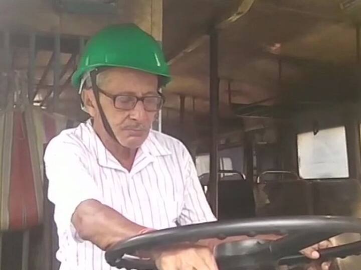Since buses are being vandalised, bus drivers wear helmets for safety in Howrah city in West Bengal to protect themselves