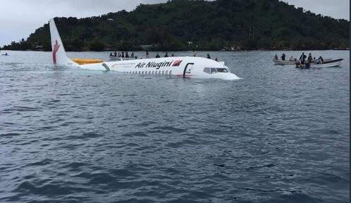 Passengers swim for life as plane overshoots runway and ditches into Pacific Lagoon Passengers swim for life as plane overshoots runway and ditches into Pacific lagoon