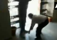 WATCH: To stop protest, professor touches feet of ABVP activists who called him ‘anti-national’