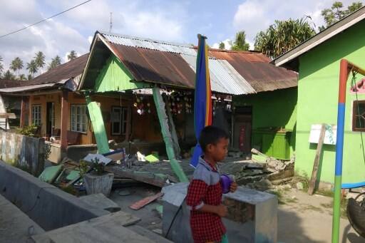 Jakarta: A tsunami struck off coastal areas near the Talisa beach off Indonesia's central province of Sulawesi, leaving at least five people missing and scores of houses destroyed, officials said on Friday. AFP IMAGE