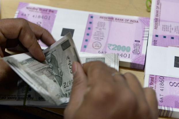 Rupee vs dollar: RBI intervention helps Indian currency to recover from record low Rupee vs dollar: RBI intervention helps Indian currency to recover from record low