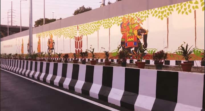 The few scenes from the mural include a celebration of Ganesha festival by village folk and the story of the mythological white elephant King Airavata who carries the Hindu rain God Indra./ Image: Screengrab from video shared by Kiran Nadar Museum of Art on Facebook