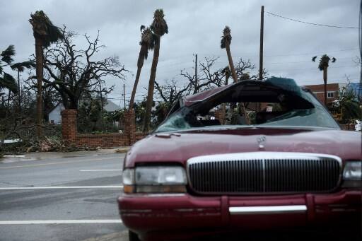 Storm damage is seen in this picture. Now, having weakened to a tropical storm, Michael was on its way to the Carolinas. However, the National Hurricane Centre (NHC) said that winds picked up at certain points along the Georgia and South Carolina coast. (Photo by Brendan Smialowski / AFP)