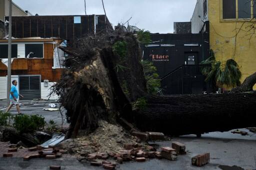 Hurricane Michael, one of the most powerful storms ever to hit the continental the US, slammed into the state of Florida, unleashing a trail of destruction by flooding beach towns, peeling off roofs and snapping trees before advancing to the Carolinas. (Photo by Brendan Smialowski / AFP)